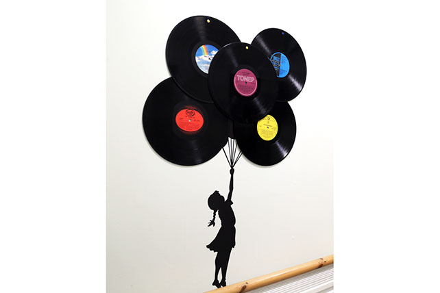 Music themed hallway, vinyl discs on the wall